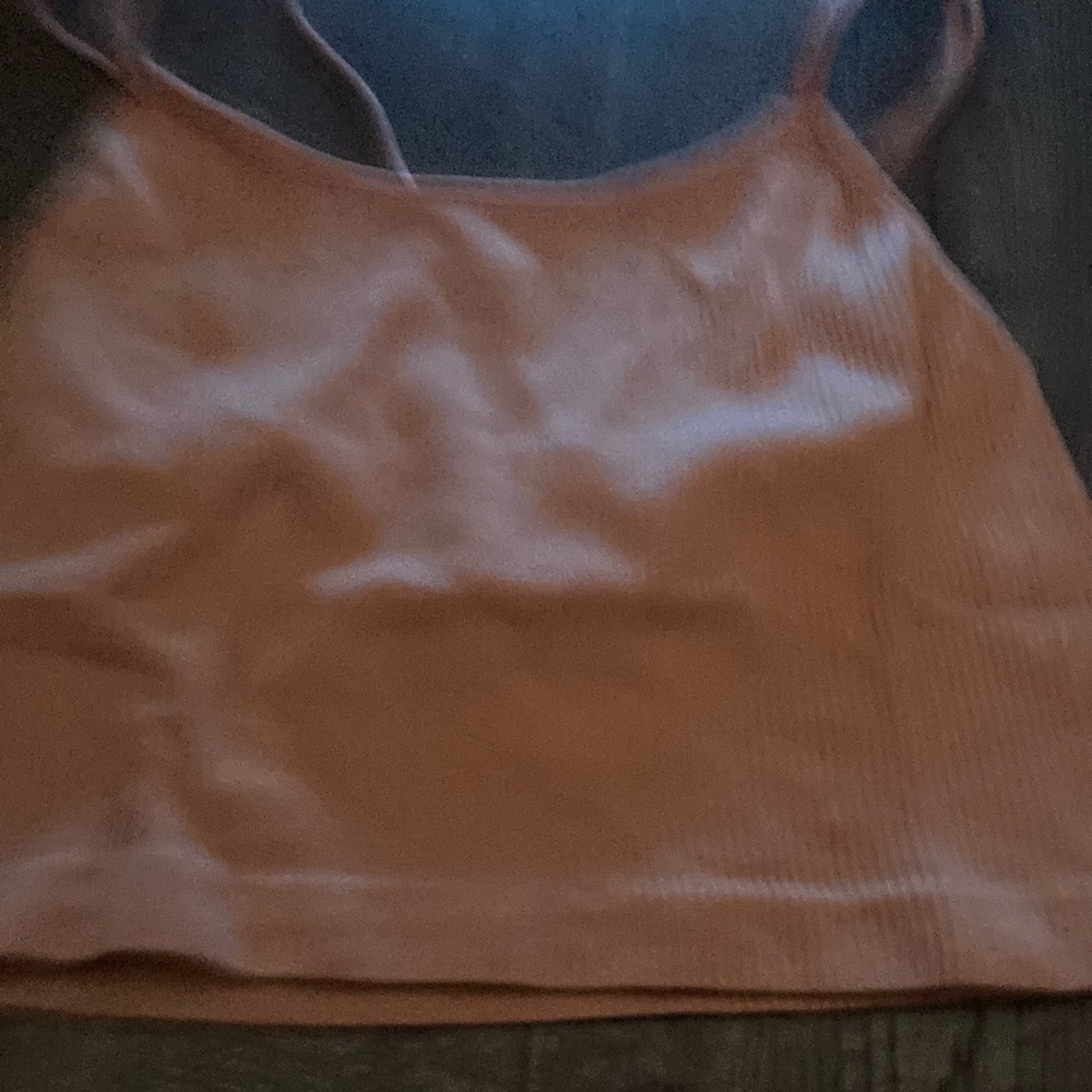 Peach color pink very cute and comfortable great for the summer